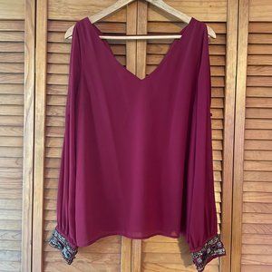 Buttons Brand long sleeve embellished top